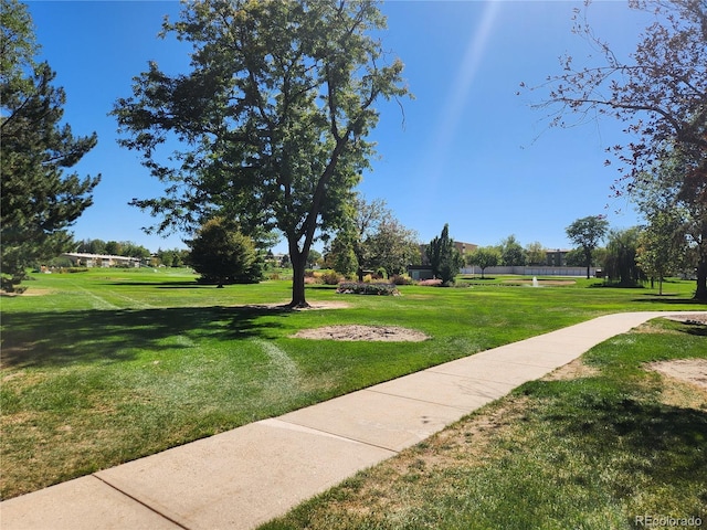 9340 E Center Ave Unit 8B, Denver, CO 80247 - view of community featuring a lawn