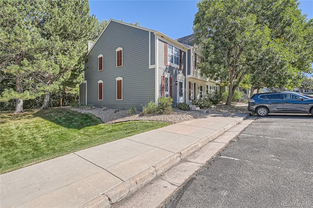 exterior space featuring a front yard