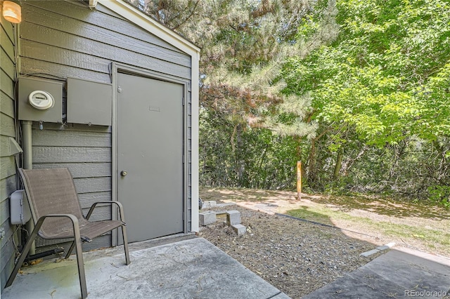 view of patio with a shed