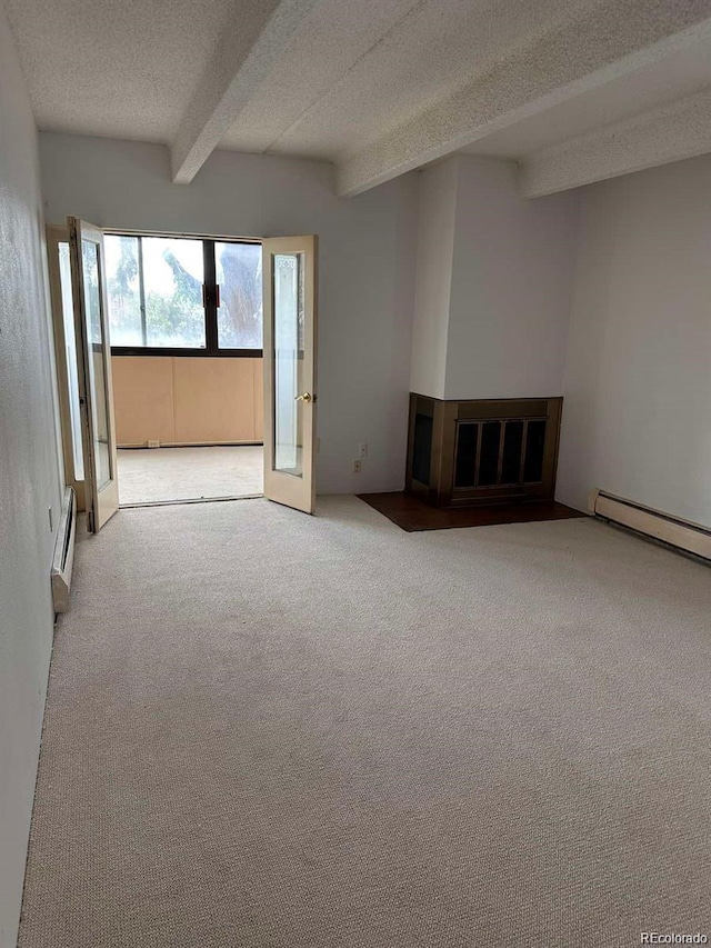 unfurnished living room with beam ceiling, baseboard heating, a fireplace with flush hearth, light carpet, and a textured ceiling