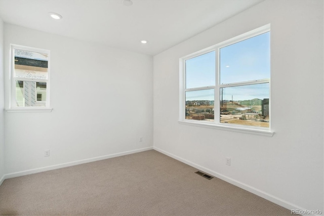 view of carpeted spare room