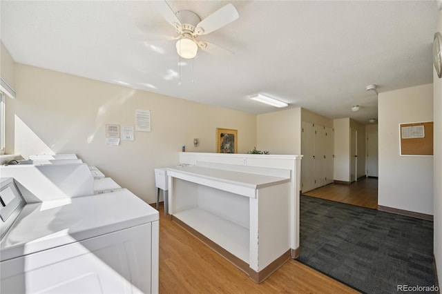7020 E Girard Ave Unit 109, Denver, CO 80224 - laundry area with light wood-style flooring, washer / dryer, and a ceiling fan
