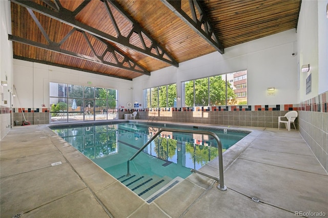 7020 E Girard Ave Unit 109, Denver, CO 80224 - indoor pool featuring a patio area
