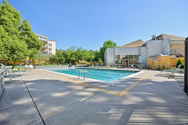 7020 E Girard Ave Unit 109, Denver, CO 80224 - community pool with a patio area