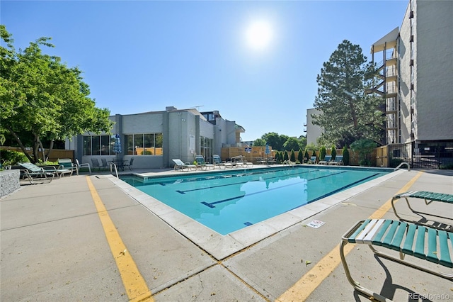 7020 E Girard Ave Unit 109, Denver, CO 80224 - community pool featuring a patio