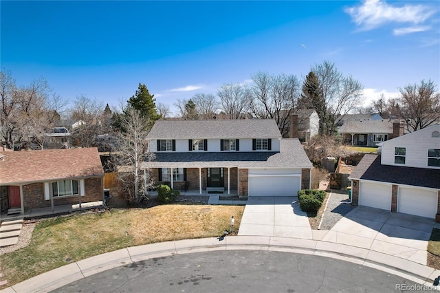 view of front of property featuring driveway, roof with shingles, covered porch, a front lawn, and brick siding