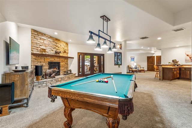 17675 State Highway 83, Colorado Springs, CO 80908 - recreation room with light carpet, billiards, a stone fireplace, and recessed lighting