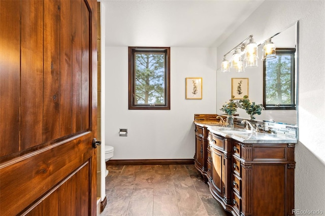 17675 State Highway 83, Colorado Springs, CO 80908 - bathroom with vanity and a chandelier