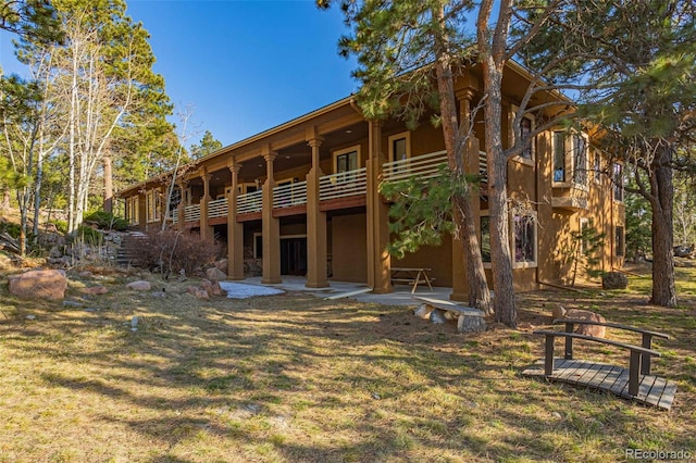17675 State Highway 83, Colorado Springs, CO 80908 - back of house with a yard