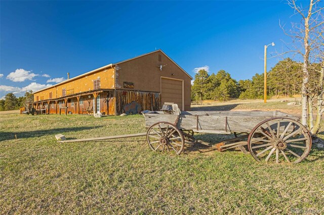 view of yard with a garage