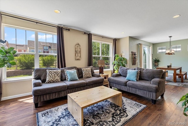 3115 Bryce Dr, Fort Collins, CO 80525 - living area with a chandelier, dark wood-type flooring, and recessed lighting