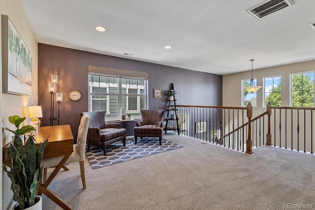 3115 Bryce Dr, Fort Collins, CO 80525 - sitting room with an upstairs landing, carpet flooring, and recessed lighting