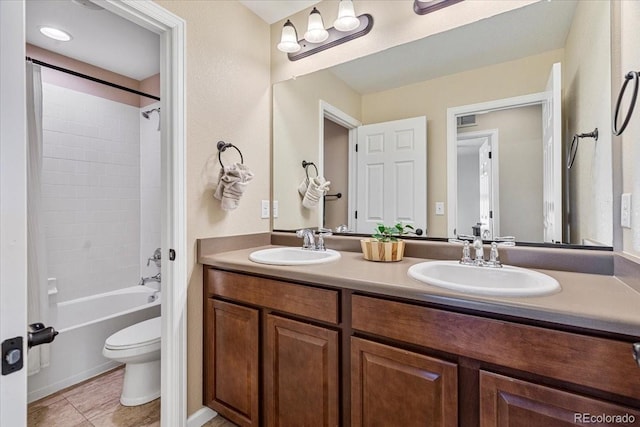 3115 Bryce Dr, Fort Collins, CO 80525 - full bath with double vanity, shower / bathtub combination, and tile patterned floors