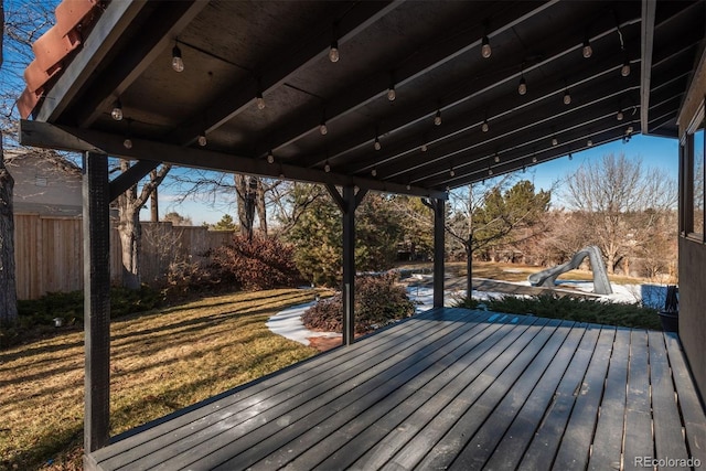 wooden deck with a yard