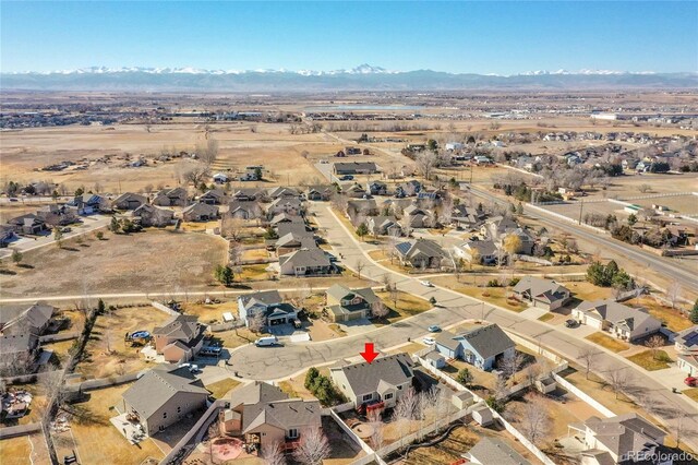 aerial view featuring a residential view and a mountain view