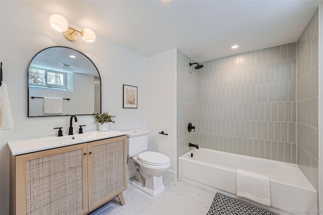 full bath with visible vents, toilet, tile patterned floors, bathtub / shower combination, and vanity