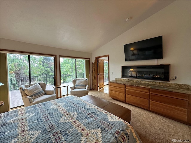 7454 Queen Cir, Arvada, CO 80005 - bedroom featuring access to exterior, carpet flooring, and lofted ceiling