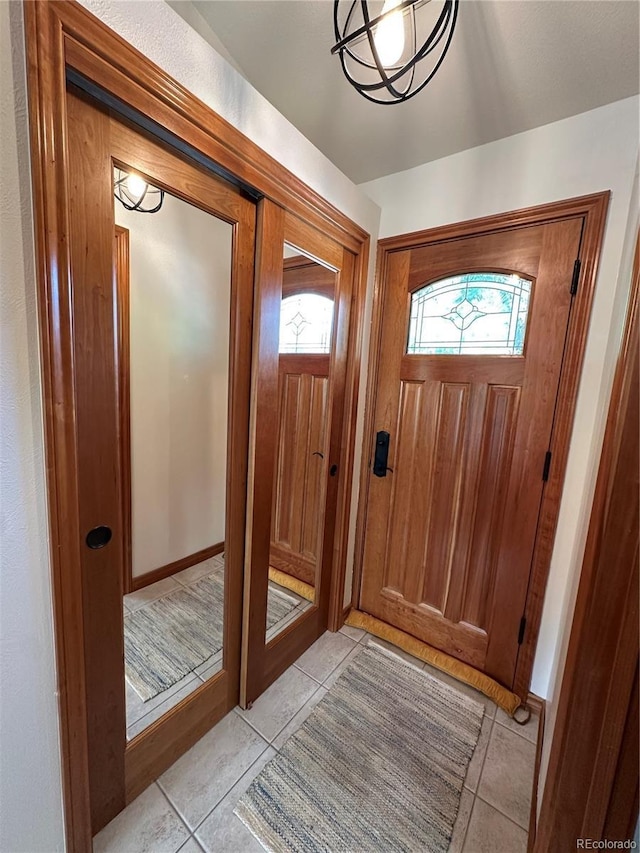 7454 Queen Cir, Arvada, CO 80005 - entryway featuring light tile patterned floors