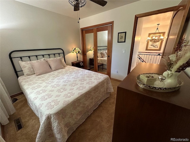 7454 Queen Cir, Arvada, CO 80005 - bedroom with carpet flooring, a chandelier, a ceiling fan, and a closet