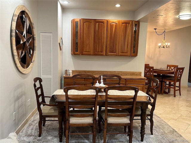 7454 Queen Cir, Arvada, CO 80005 - dining area with recessed lighting and light stone finish floors