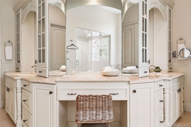 9171 E Harvard Ave, Denver, CO 80231 - full bathroom featuring double vanity