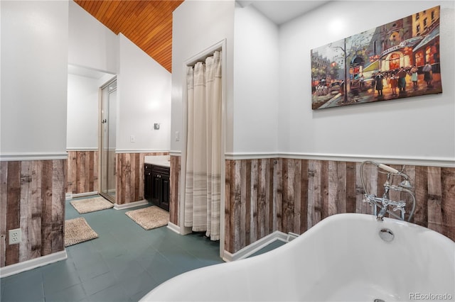 full bathroom with wooden walls, wainscoting, lofted ceiling, and wooden ceiling