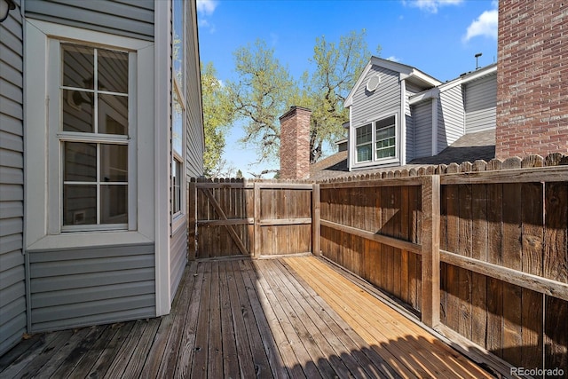 wooden deck featuring fence