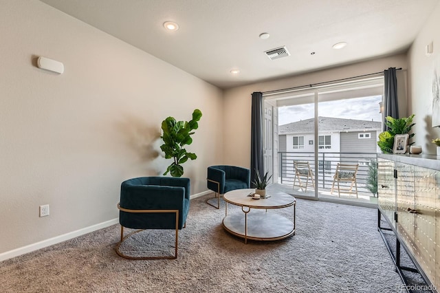 sitting room with carpet, visible vents, baseboards, and recessed lighting