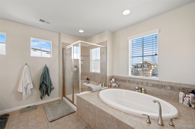 bathroom featuring separate shower and tub and tile patterned flooring