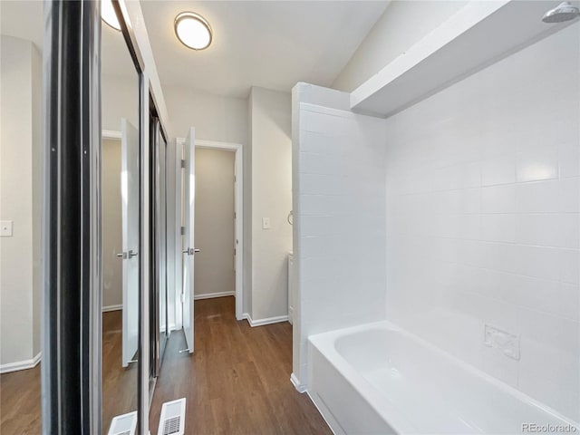 bathroom with wood-type flooring