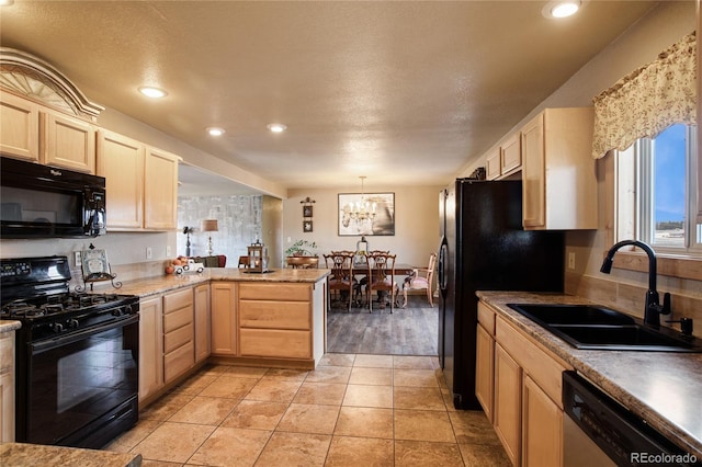 kitchen with kitchen peninsula, sink, black appliances, decorative light fixtures, and light tile patterned flooring