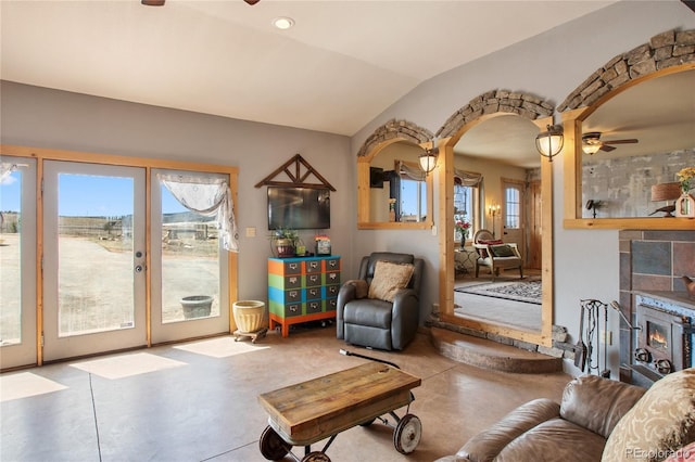 interior space featuring french doors, vaulted ceiling, and ceiling fan