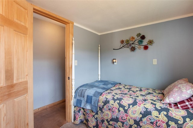 bedroom with carpet and ornamental molding