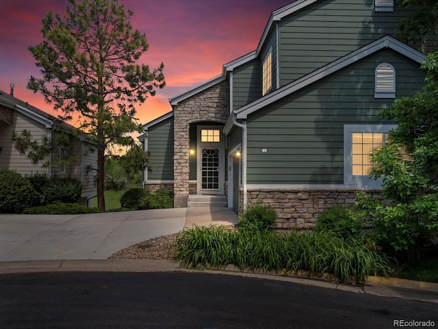 7400 W Grant Ranch Blvd Unit 19, Littleton, CO 80123 - view of front of home with stone siding