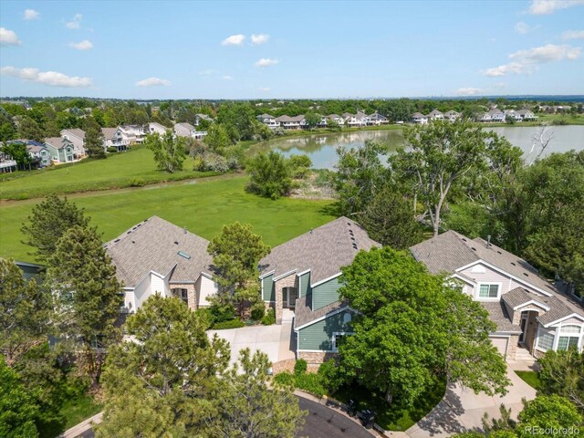 7400 W Grant Ranch Blvd Unit 19, Littleton, CO 80123 - aerial perspective of suburban area with a nearby body of water