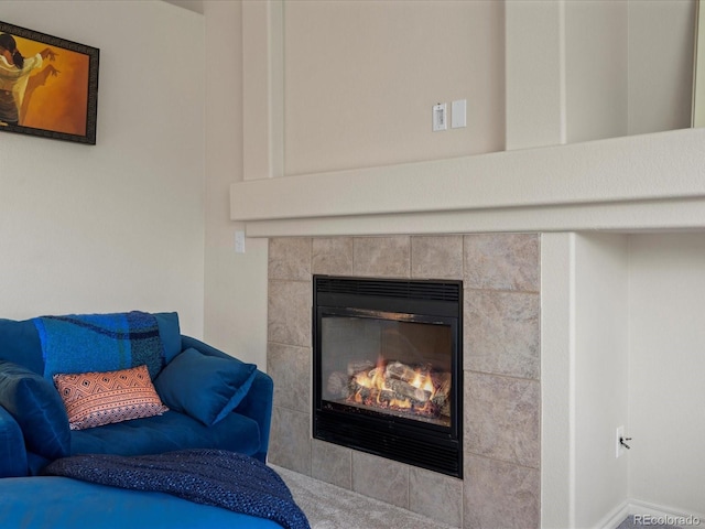 7400 W Grant Ranch Blvd Unit 19, Littleton, CO 80123 - living area with a tile fireplace and baseboards