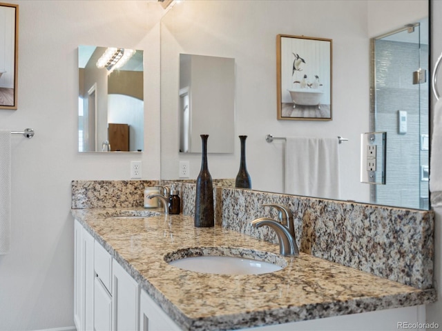 7400 W Grant Ranch Blvd Unit 19, Littleton, CO 80123 - full bath featuring double vanity and a shower with shower door