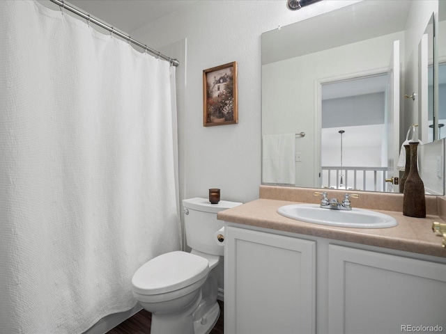7400 W Grant Ranch Blvd Unit 19, Littleton, CO 80123 - full bathroom featuring toilet, vanity, and a shower with curtain