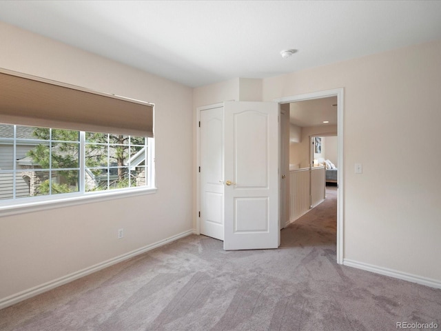 7400 W Grant Ranch Blvd Unit 19, Littleton, CO 80123 - unfurnished bedroom with carpet floors and baseboards