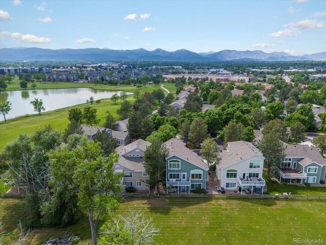7400 W Grant Ranch Blvd Unit 19, Littleton, CO 80123 - aerial perspective of suburban area with a water and mountain view