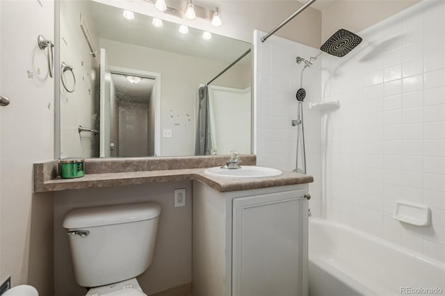 full bathroom featuring vanity, toilet, and shower / tub combo with curtain