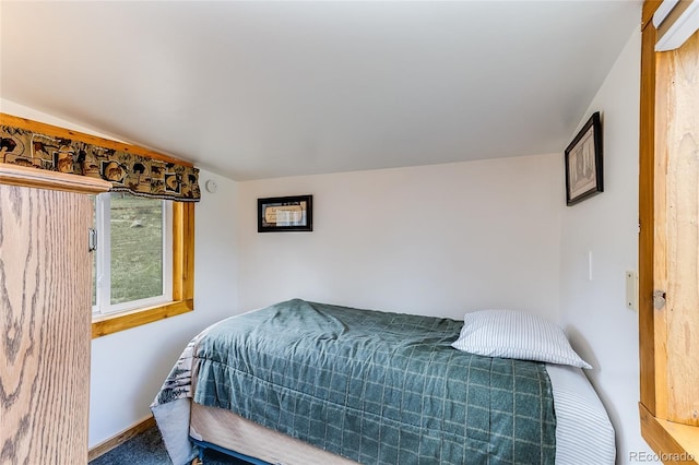 bedroom with vaulted ceiling