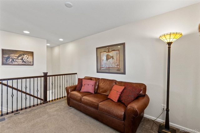 living room featuring carpet floors, recessed lighting, and baseboards