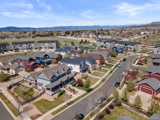 aerial view of residential area with a mountain backdrop