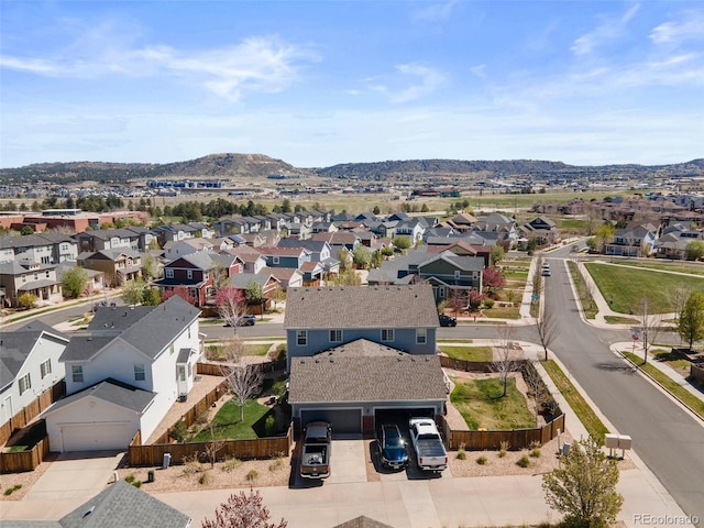 aerial perspective of suburban area with a mountain backdrop