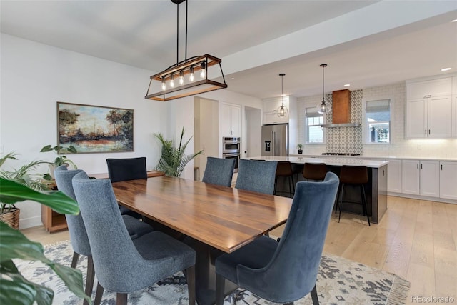 785 Delechant Dr, Erie, CO 80516 - dining space featuring light wood-style flooring and recessed lighting