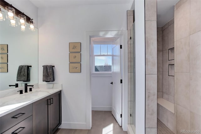 785 Delechant Dr, Erie, CO 80516 - full bathroom with vanity, tiled shower, and tile patterned flooring