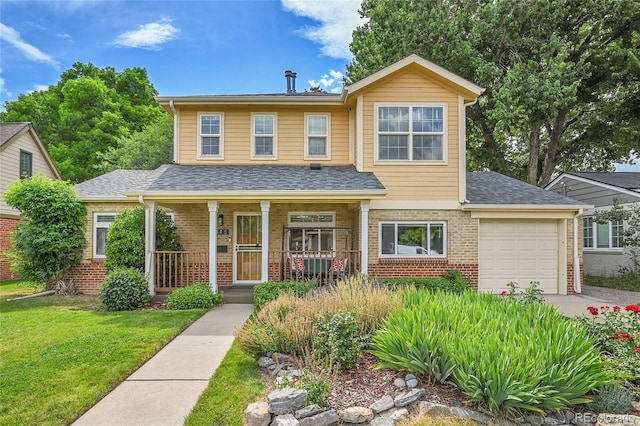 845 Jasmine St, Denver, CO 80220 - view of front of home featuring brick siding, covered porch, an attached garage, a front yard, and a shingled roof