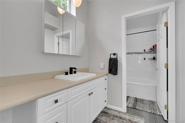 845 Jasmine St, Denver, CO 80220 - full bath featuring vanity and tiled shower / bath
