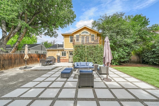 845 Jasmine St, Denver, CO 80220 - patio / terrace featuring an outdoor living space, a patio, a fenced backyard, and outdoor dining space
